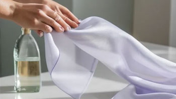 A Woman Cleaning Silk Scarf
