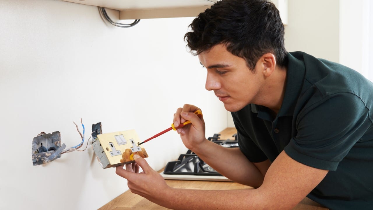 Installing an outlet.
