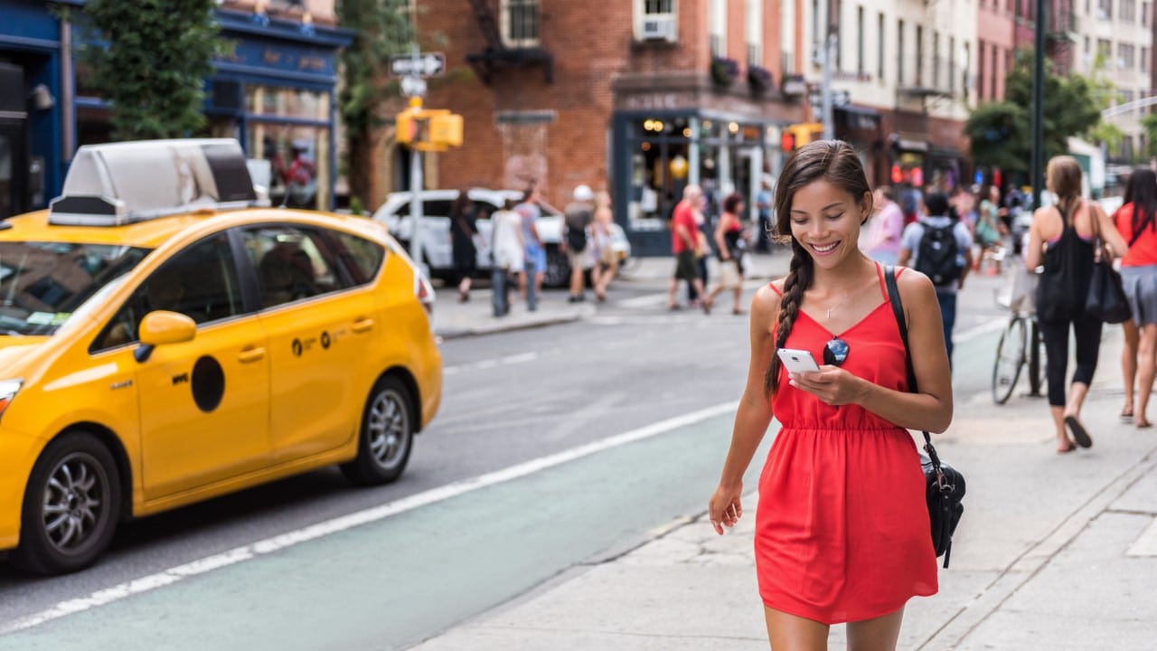 Woman walking instead of driving a car to save money
