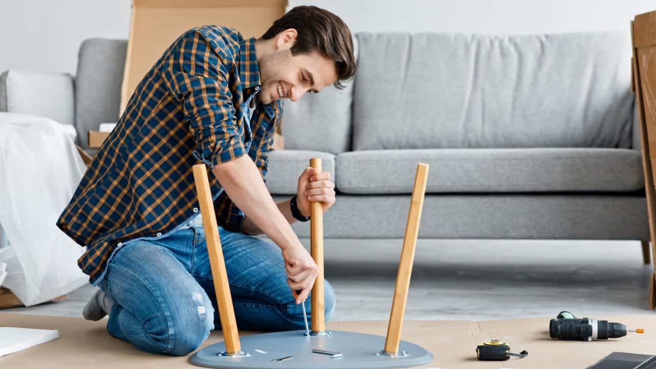 Furniture,Repair,And,Assembly,,Handyman,Fixing,Table,Using,Tool,,Assembling